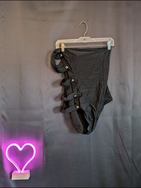 High-Waist Black One-Piece Swimsuit with Side Strap Details One Shoulder Cutout